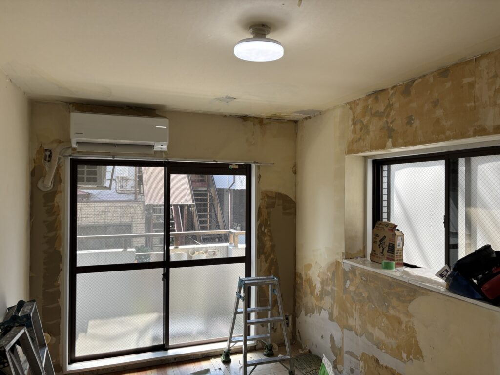The wall after the wallpaper has been removed.