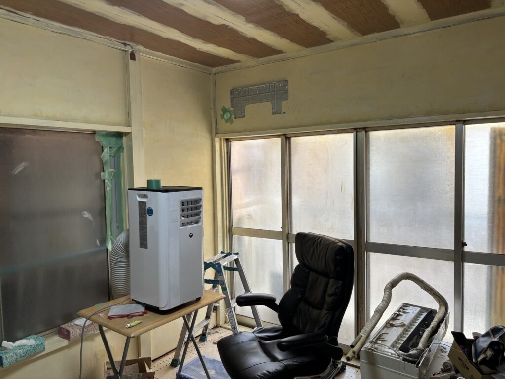 Cluttered room before air conditioner installation