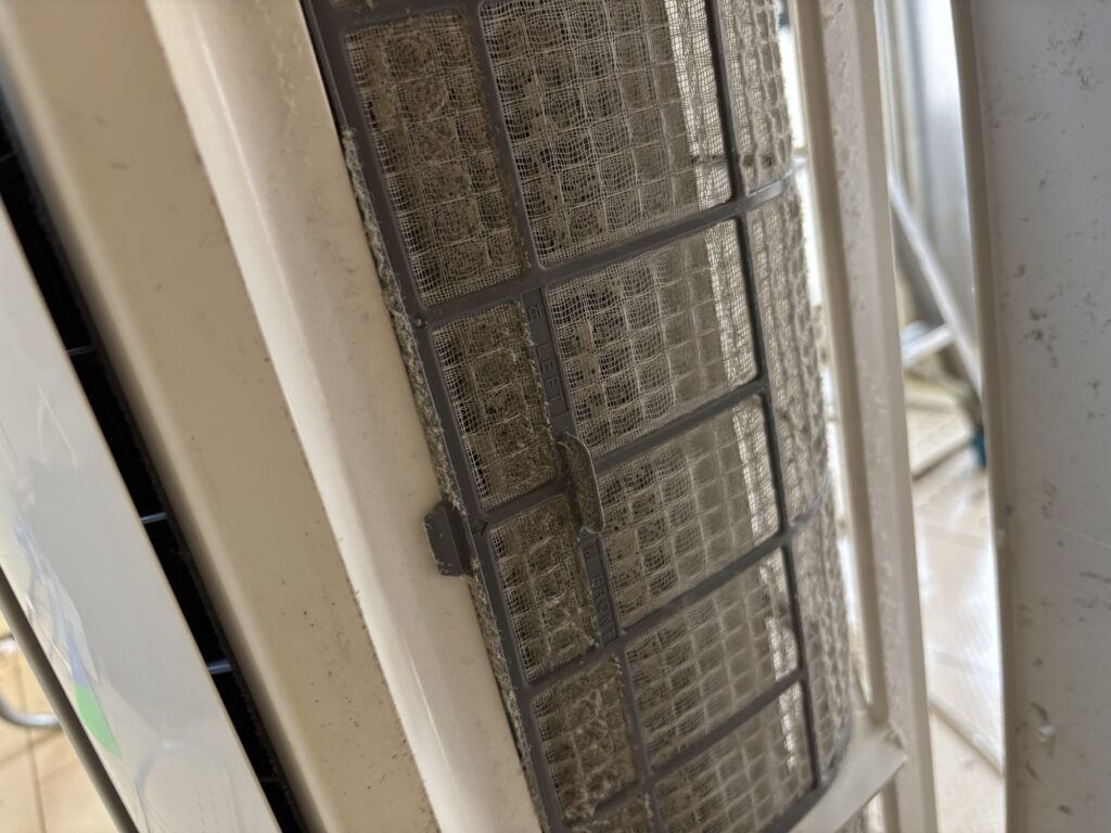 Dirty air conditioner filter before cleaning