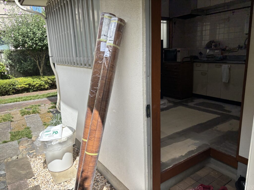 Vinyl flooring materials prepared for kitchen floor installation