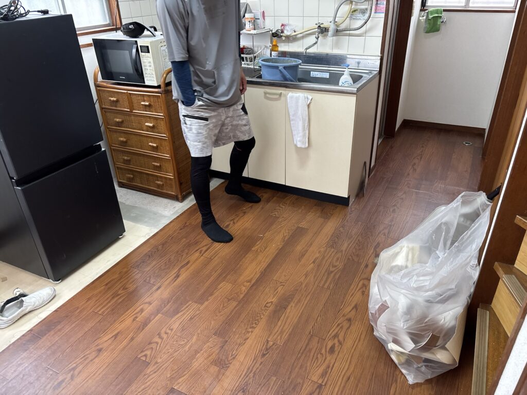 Completed kitchen floor after cushion flooring installation with a clean, durable, and refreshed finish.