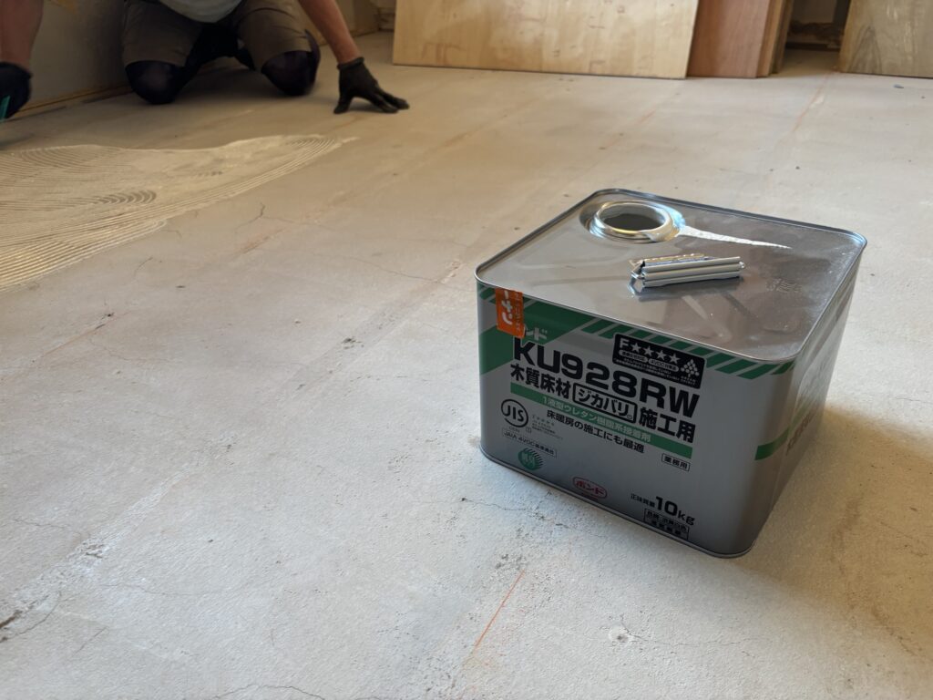 Construction adhesive prepared for 12 mm plywood subfloor installation