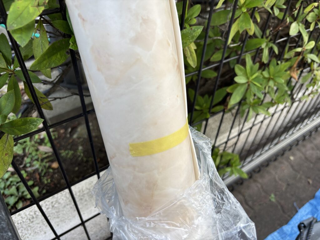 New vinyl flooring material prepared for installation in a small apartment toilet