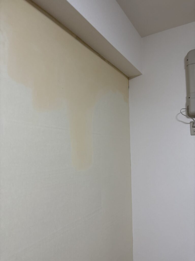 Living room wall after finishing putty was applied and the surface was prepared for wallpaper