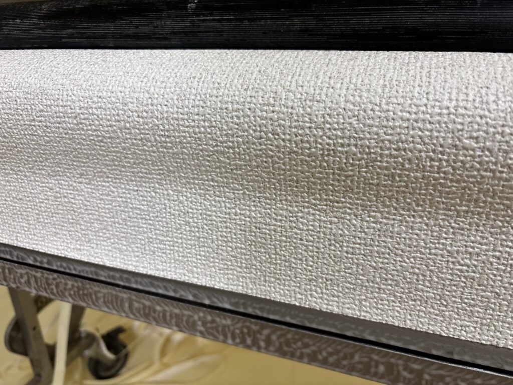 Thick heavily embossed wallpaper material for condominium renovation