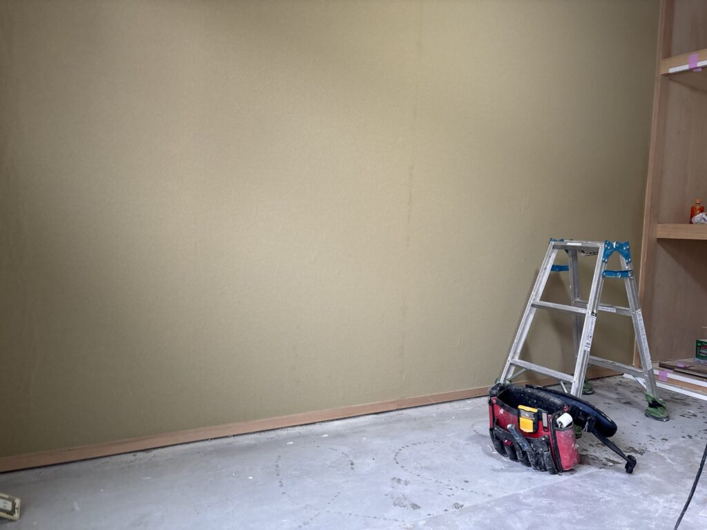 Finished Japanese-style room wall covered with textured diatomaceous earth wallpaper.