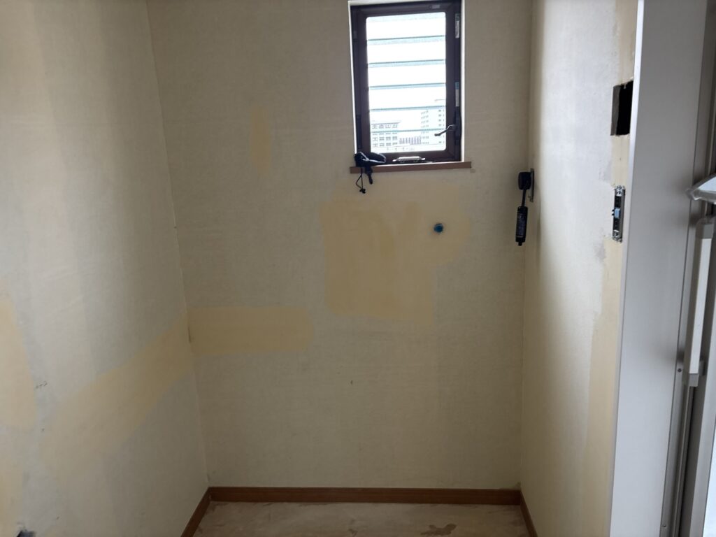 Repaired wall area after finishing filler was applied
