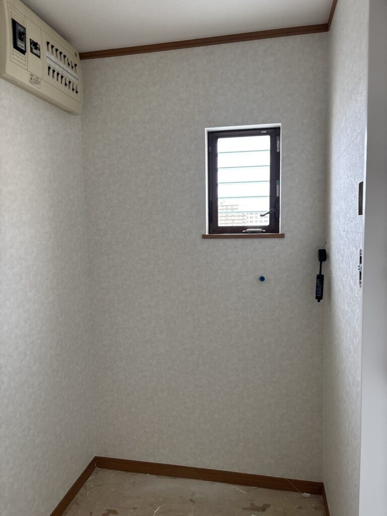 Completed new wallpaper installation on the washroom walls