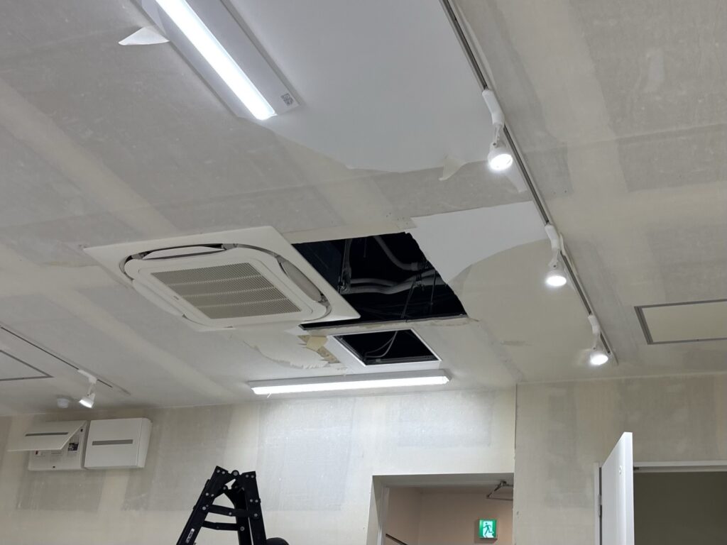 Ceiling opening before new gypsum board was installed during a commercial renovation.