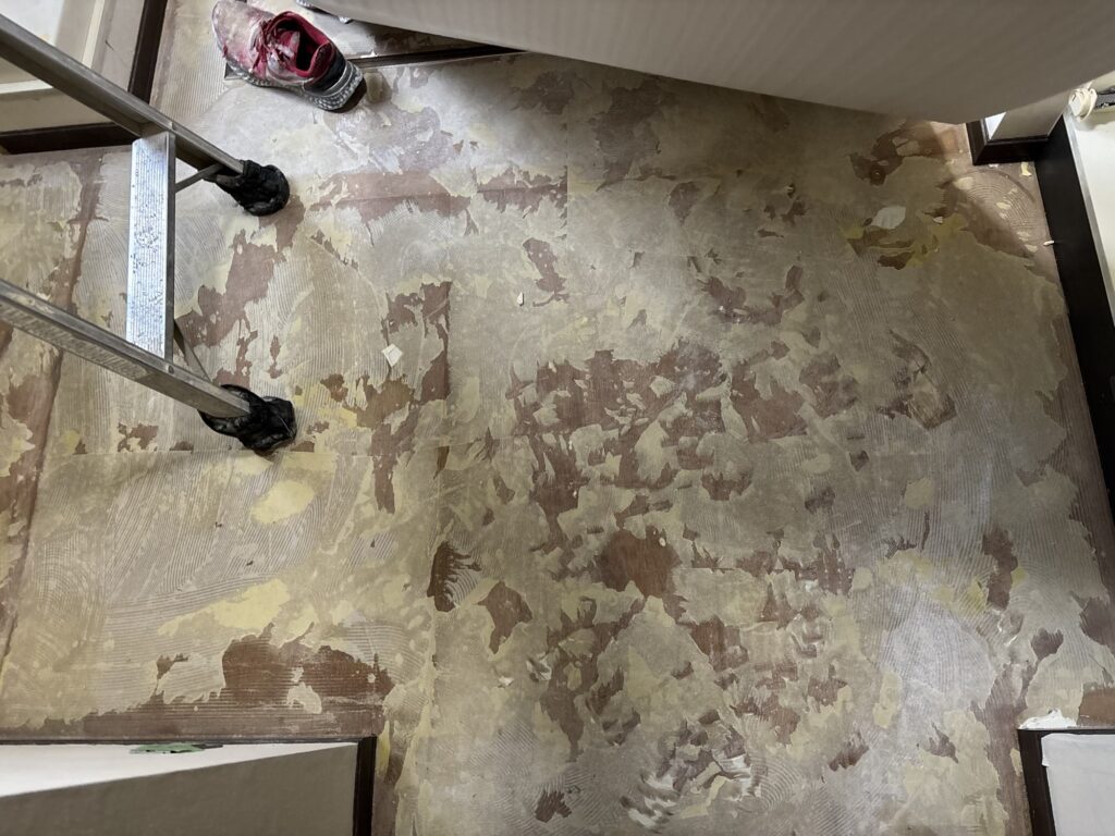 Washroom floor before cushion flooring installation in a Japanese detached house.