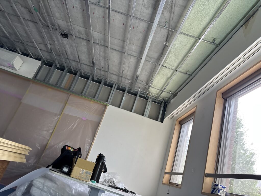 Living room area of a vacant 2LDK apartment in Japan before renovation work began.