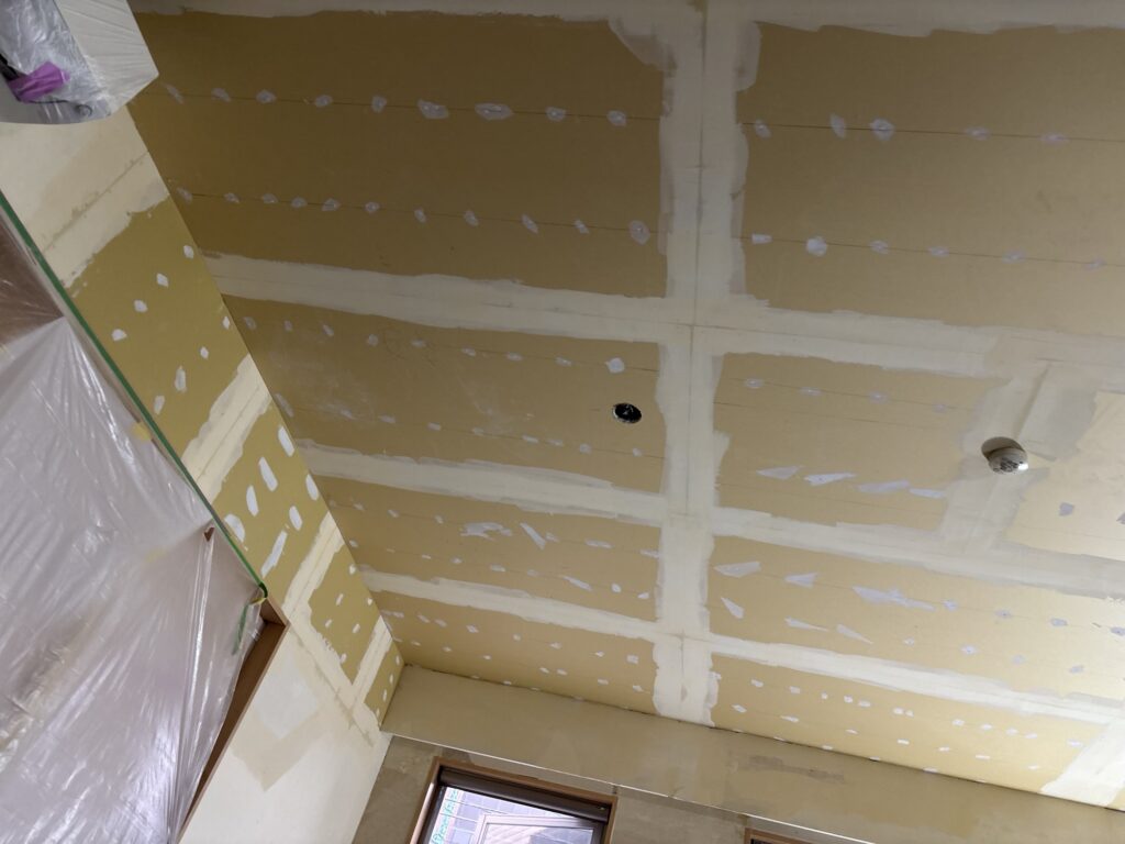 Interior of a Japanese apartment before the wallpaper installation work started.