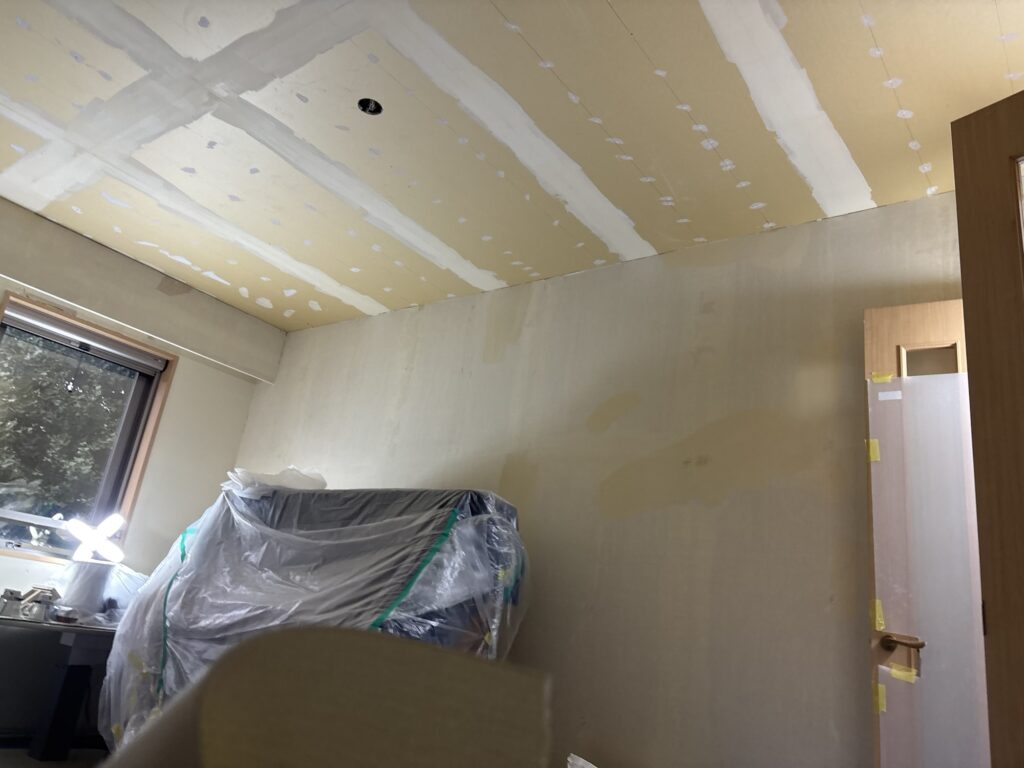 Japanese apartment interior before wallpaper installation and renovation work began.